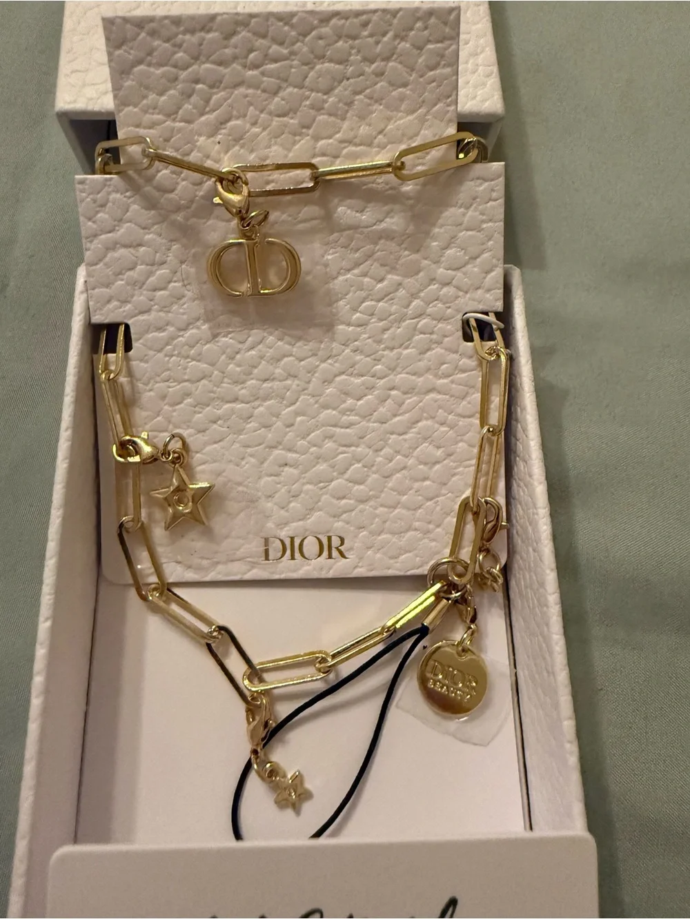Dior Gold Star Phone Charm
